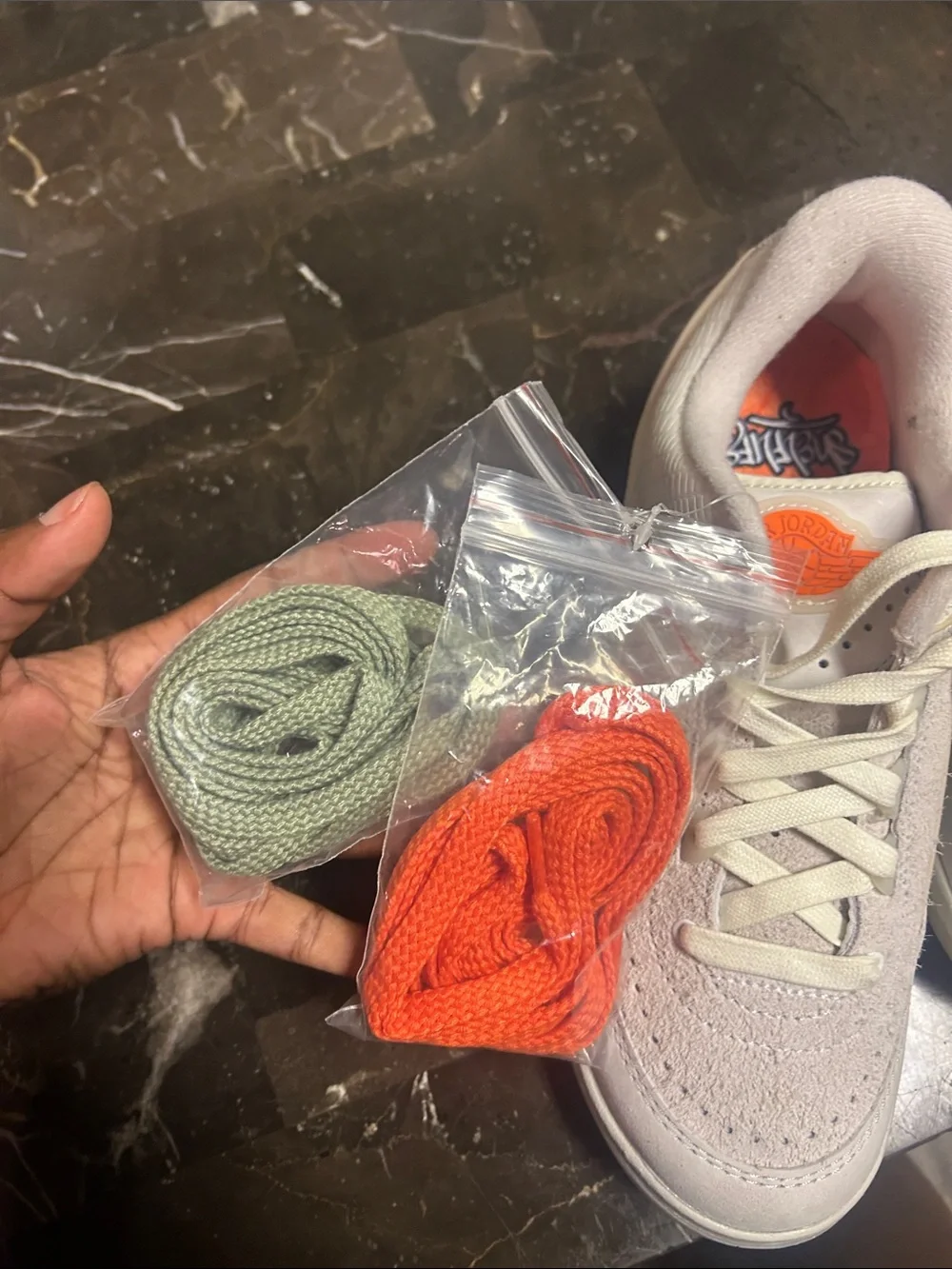 Jordan Low-Top Sneakers in Light Gray with Orange Accents